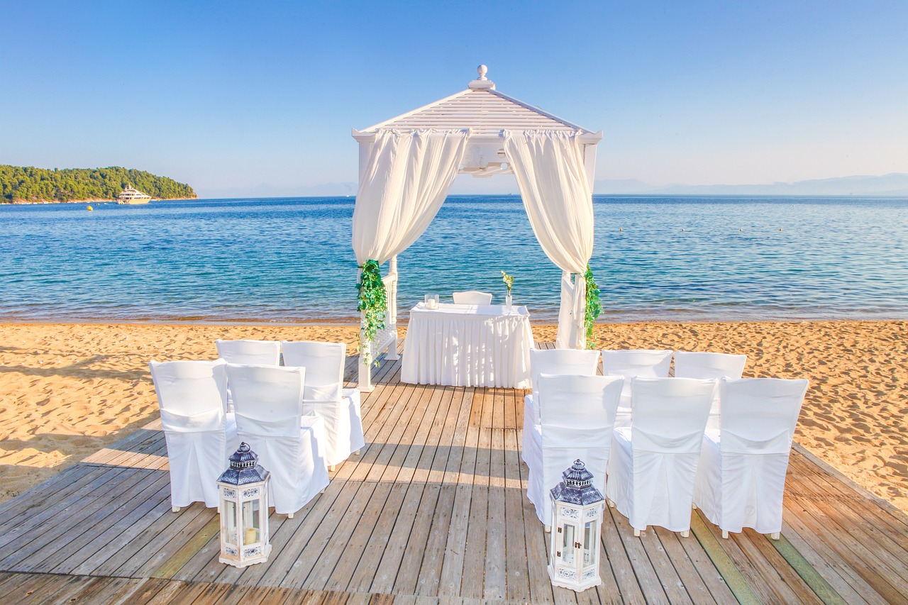 Wedding ceremoney setup on a beach with ocean in the background